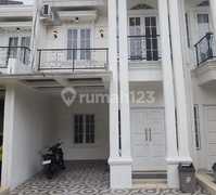 Rumah Take Over Modern Clasic DP Murah di Kalimulya Dekat St Depok