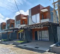 Rumah Modern Cluster Aretha Raya Living Ciganitri Ciwastra