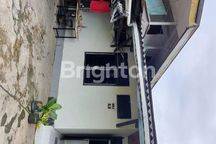 RUMAH DI TENGAH KOTA 