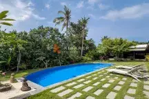 Kedungu Oasis: Elegant Four-Bedroom Villa with Enclosed Living, Pool & Lush Garden YRR3563