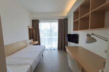 Cozy and Modern Apartment Close to Airport in Sunset Road Kuta