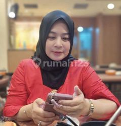Tuty Aminah Syafiani 