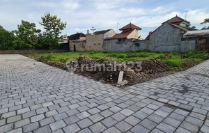 3 Km to UGM Campus, Land for Sale Monjali Jogja, near North Ringroad, 2 cars passing smoothly.