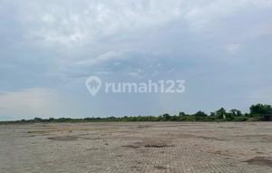 Wide Land for Rent on Tambak Osowilangun Street, Near Teluk Lamong Port, Suitable for container depot/heavy equipment parking/iron roll stockpile or also for sand/coal/gravel/porang stockpile.