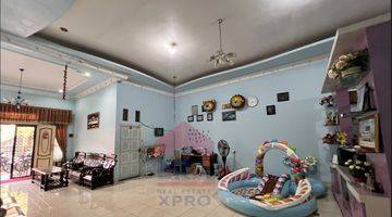 ruang keluarga rumah cluster villa gading raya