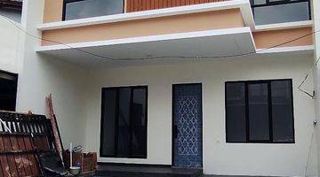 tampak depan rumah mungil yang cantik rapih
