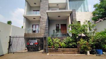 tampak depan rumah mewah minimalis di permata