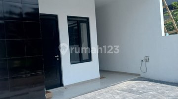 tampak depan rumah baru kpr bank di