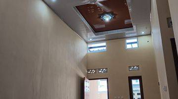 ruang tamu rumah baru siap huni nempel