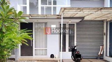 tampak depan rumah minimalis dalam cluster di