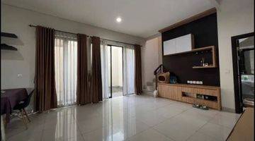 ruang tamu rumah cluster di eminent bsd