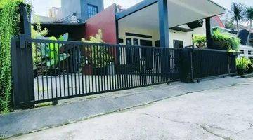 tampak depan rumah hook murah dalam perumahan