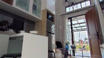 ruang tamu rumah modern minimalis dalam cluster