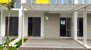 tampak depan disewakan rumah pik 2 cluster