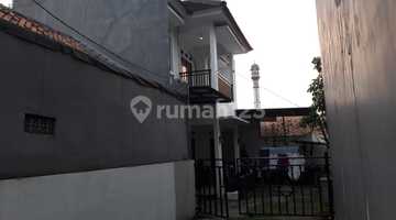 tampak depan rumah siap huni di bawah