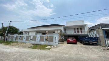 tampak depan rumah mewah besar masih progress