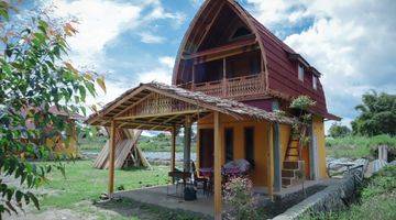tampak depan villa dan lahan investasi  di