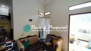 ruang tamu rumah baru dalam  cluster di