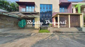 tampak depan rumah murah dalam cluster di