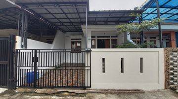 tampak depan rumah siap huni hadap selatan