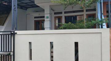 tampak depan rumah siap huni hadap selatan
