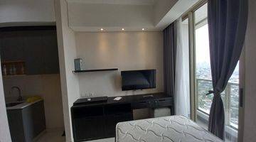 Gambar 1 Apartemen Taman Anggrek Residence Furnished Studio Jual Rugi 1 BR