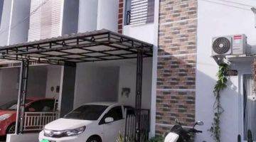 tampak depan rumah cantik siap huni di