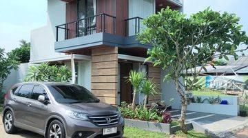 tampak depan rumah baru lingkungan berkonsep bali