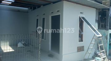 tampak depan jual rumah tengah kota mugas