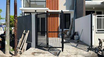 tampak depan rumah baru jadi gres belum