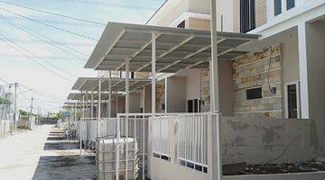 garasi/carport oper kredit rumah 2 lantai