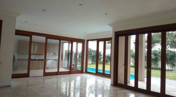 Gambar 1 A 2 storey, 6 bedroom, stand alone house located in Cipete, Jakarta with 5 bathrooms, 1 study, a pool and a yard.