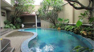 Gambar 1 A 2 storey, 4 bedroom, stand alone house located in Pondok Indah, Jakarta with 4 bathrooms and a pool.