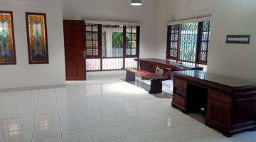 Gambar 2 A 2 Storey, 3 Bedroom, Compound House Located In Cilandak, Jakarta With A Shared Pool And A Yard.