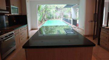 Gambar 1 A 2 Storey, 5 Bedroom, Compound House Located In Kemang Utara, Jakarta With 4 Bathrooms, A Pool And A Yard.