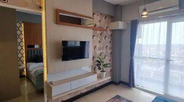 Gambar 1 2 BR • 56 m² Baru Gress Apartemen Puncak Dharmahusada 
