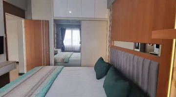 Gambar 4 2 BR • 56 m² Baru Gress Apartemen Puncak Dharmahusada 
