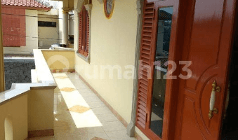 Gambar 2 Dijual Rumah Duren Sawit Pondok Kopi Lokasi Hook dan Depan Taman