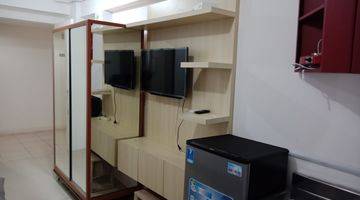 Gambar 1 Apartemen di Tengah Kota