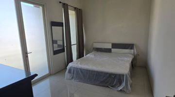 Gambar 2 Disewakan Rumah 2 Lantai Semi Furnished Jalan Woodland Citraland Surabaya