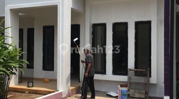 tampak depan rumah dalam cluster  siap huni