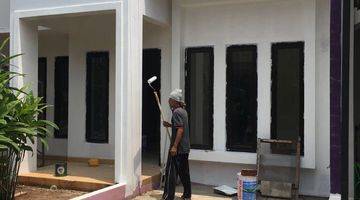 tampak depan rumah dalam cluster  siap huni