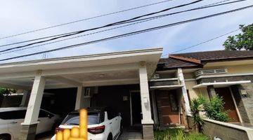 tampak depan rumah minimalis di dalem cluster