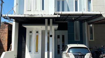 tampak depan rumah 2 lantai siap huni