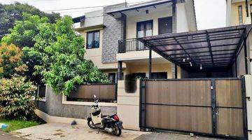 tampak depan rumah 2 lantai siap huni