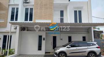 tampak depan rumah baru  cluster 2 lantai