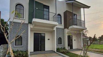 tampak depan rumah 2 lantai gaya maroko