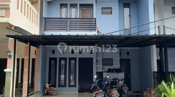 tampak depan rumah 2 lantai siap huni