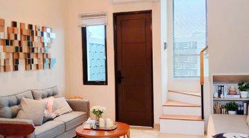 ruang tamu rumah cluster tanah luas konsep