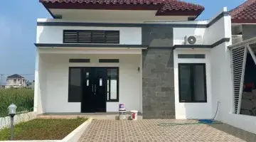 tampak depan rumah modern tanah lega dp